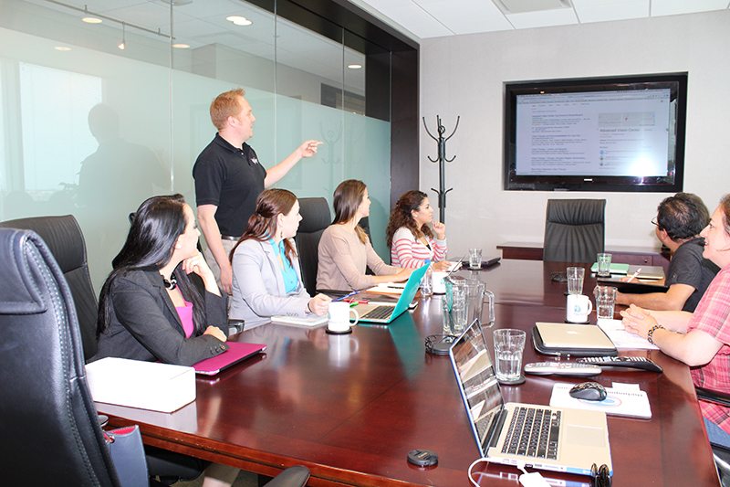 Photo of people getting training on online marketing